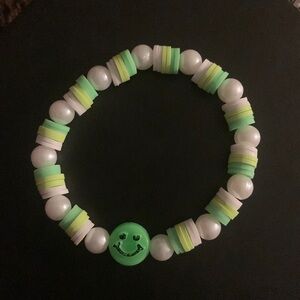 Green smiley face bracelet